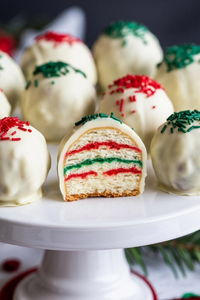 White chocolate truffles with festive red and green sprinkle topping.