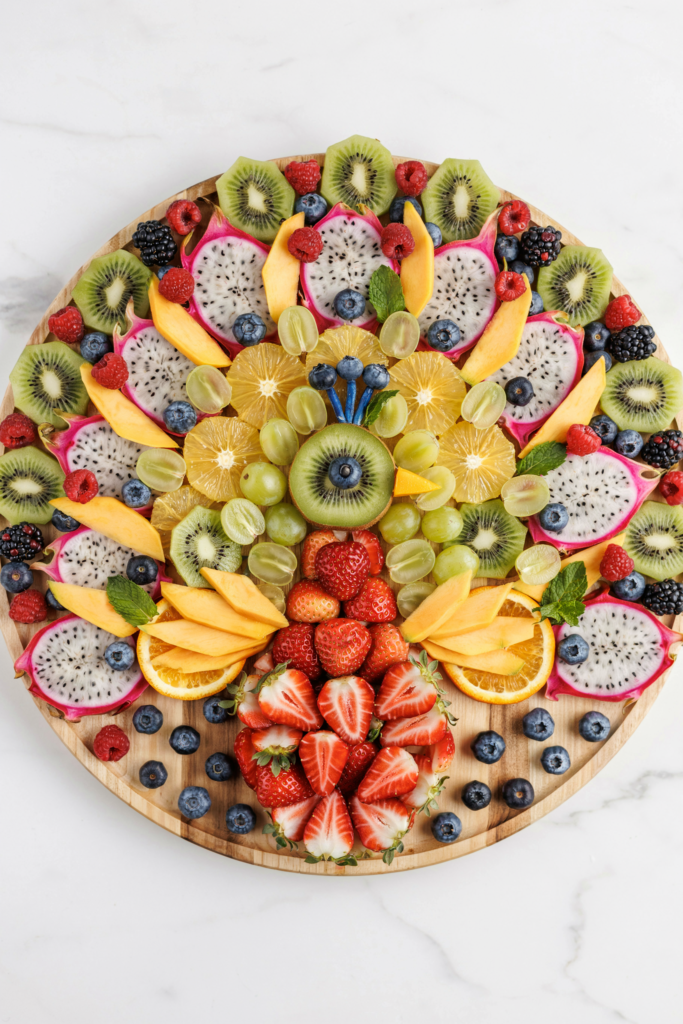 Rainbow Fruit Peacock Charcuterie Board