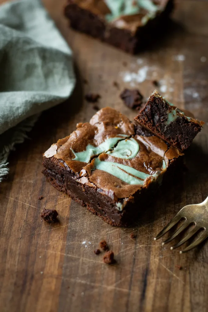 Mint chocolate swirl brownie cookies with green frosting swirls