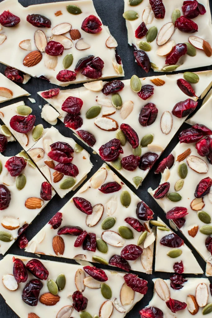 White chocolate bark studded with dried cranberries and pistachios, broken into shards